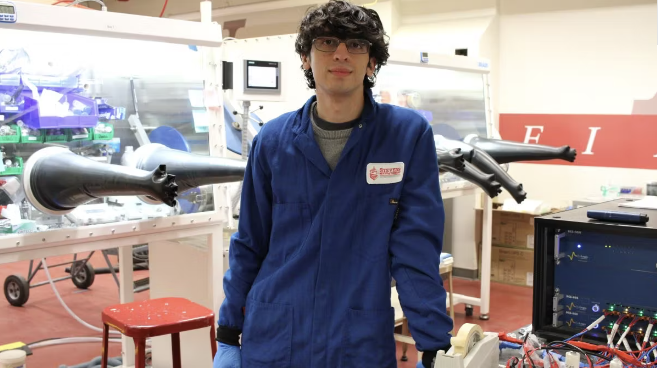 Angel Burgos in Professor Jae Chul Kim's battery lab