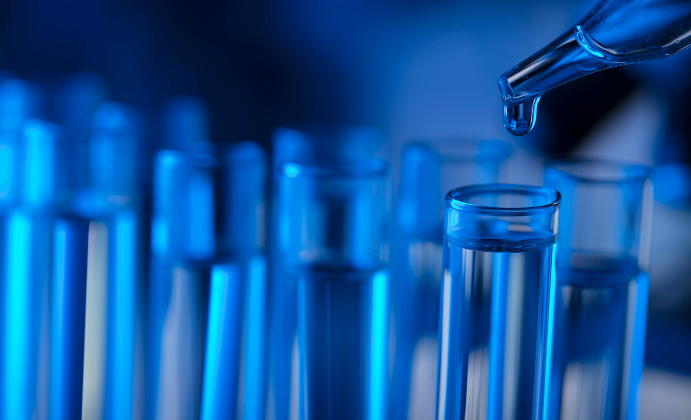 a close-up image of liquid-filled test tubes